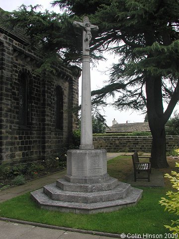 The World War I memorial in the churchyard at Shadwell.