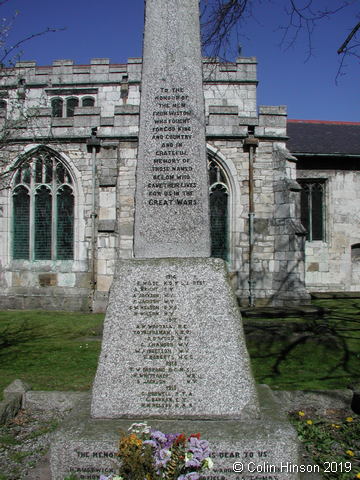 The War Memorial in All Saints' Churchyard, Wistow.
