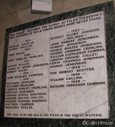 The Memorial Plaque for Fishermen, on the wall of St Oswald's Church.