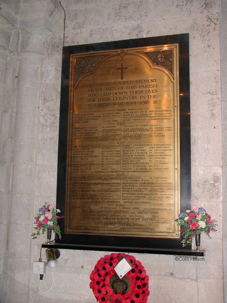 The 1914-19 War Memorial Plaque on the wall of St Oswald's Church.
