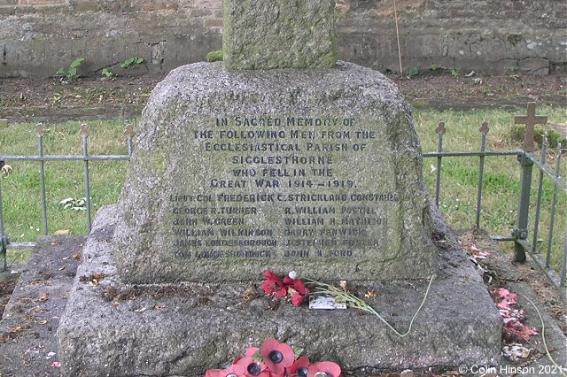 The 1914-18 War Memorial in Sigglesthorne Churchyard.