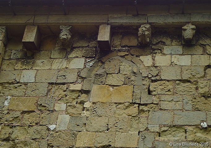 Part_of_the_south_wall_of_the_church_showing_a_blocked_window057