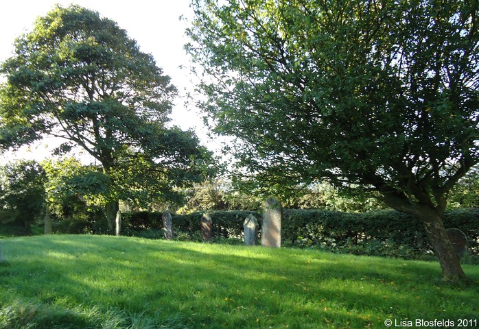 Graves_near_road_from_base_of_tower203