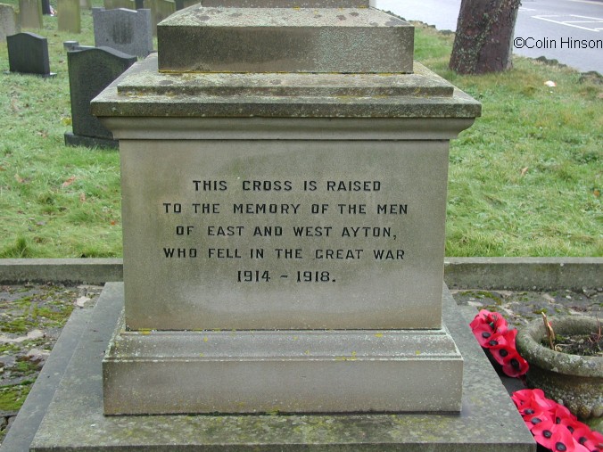 The 1914-18 and 1939-45 War Memorial in the Churchyard at East Ayton.