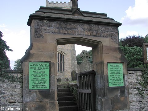 The War Memorial plaques on the entrance arch to Gilling East churchyard:
