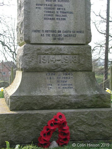 The War Memorial in All Saints' Churchyard, Pickhill.