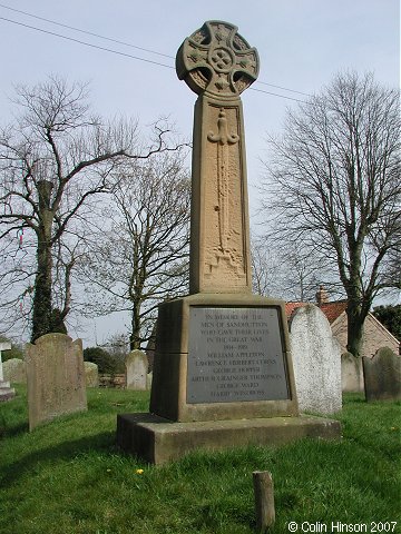 The War Memorial in St. Leonard's Churchyard, Sand Hutton, near Thirsk.