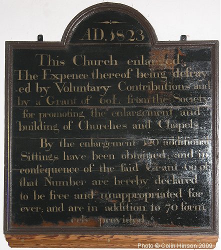 The plaque giving Church enlargement information in St. Mary's Church, Great Ouseburn.
