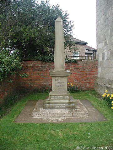 The World War I and II memorial in the churchyard at Great Ouseburn.