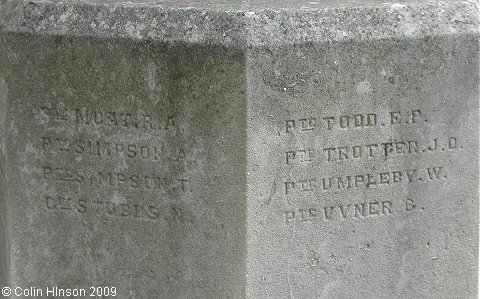 The World War I memorial in the churchyard at Shadwell.